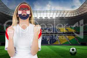 Excited croatia fan in face paint cheering