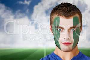 Nigeria football fan in face paint