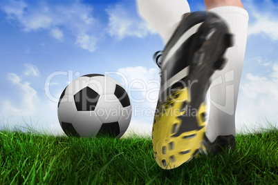 Football boot kicking ball