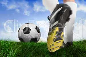 Football boot kicking ball