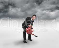 Composite image of businessman watering with red can