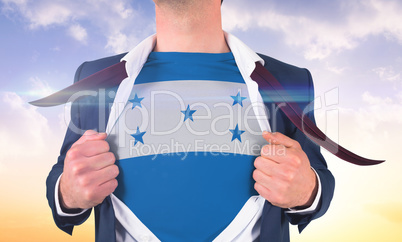 Businessman opening shirt to reveal honduras flag Businessman opening shirt to reveal honduras flag