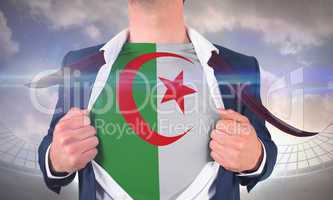 Businessman opening shirt to reveal algeria flag