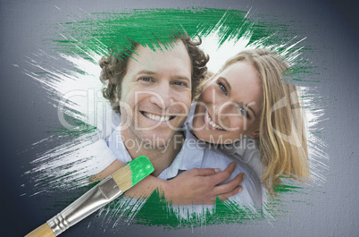 Composite image of couple smiling at camera