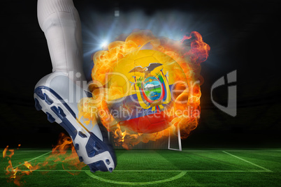 Football player kicking flaming ecuador flag ball