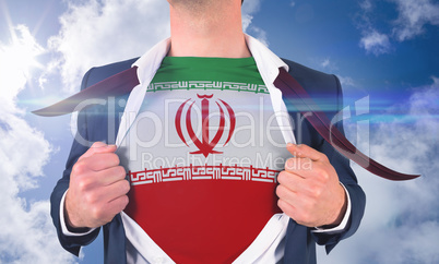 Businessman opening shirt to reveal iran flag