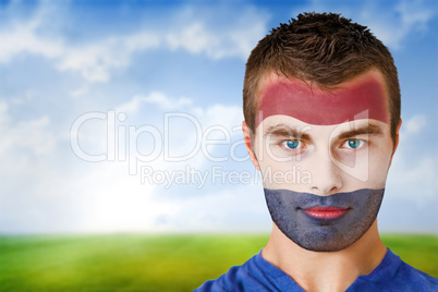 Netherlands football fan in face paint