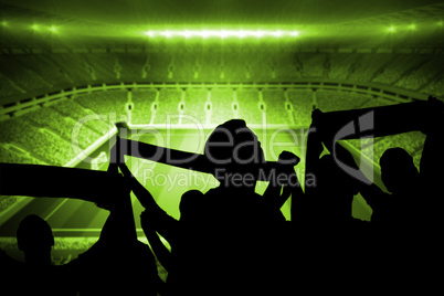 Silhouettes of football supporters