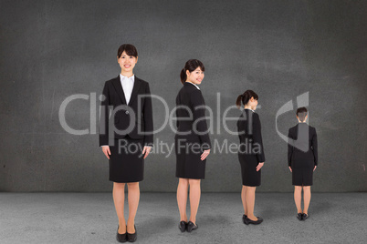 Composite image of multiple image of businesswoman