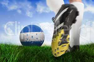 Football boot kicking honduras ball
