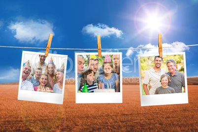 Composite image of instant photos hanging on a line