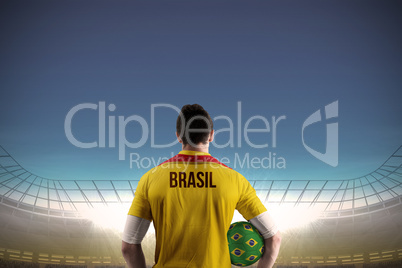 Brasil football player holding ball