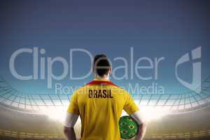 Brasil football player holding ball