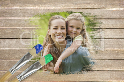 Composite image of mother and daughter in the park