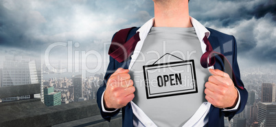 Composite image of businessman opening shirt in superhero style