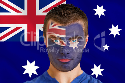 Serious young australia fan with facepaint