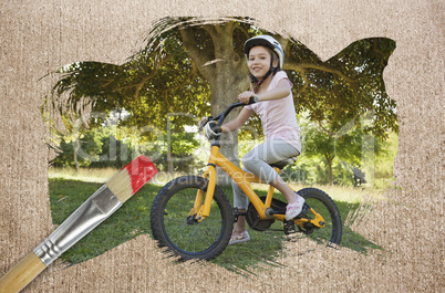 Composite image of little girl on a bike