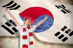 Excited asian football fan cheering