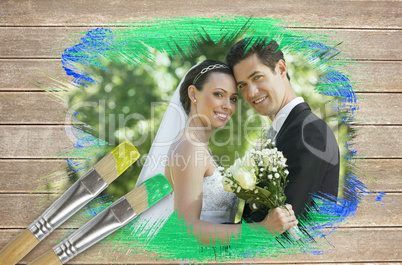Composite image of newlyweds smiling at camera
