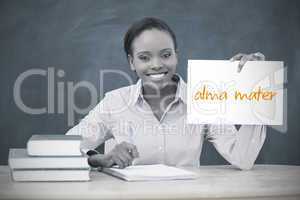 Happy teacher holding page showing alma mater