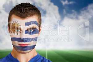 Uruguay football fan in face paint