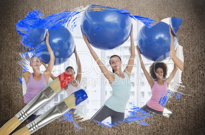 Composite image of fitness class at the gym