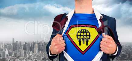 Composite image of businessman opening shirt in superhero style