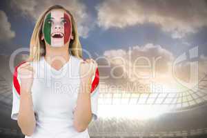 Excited italy fan in face paint cheering