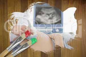 Composite image of woman getting an ultrasound