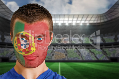 Portugal football fan in face paint