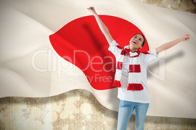 Excited asian football fan cheering