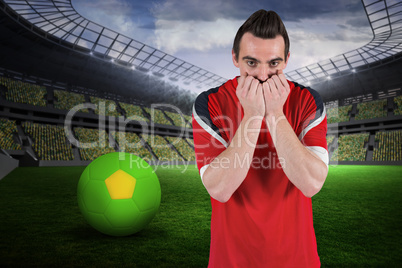 Nervous football fan looking ahead Nervous football fan looking ahead