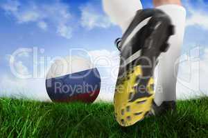 Football boot kicking russia ball