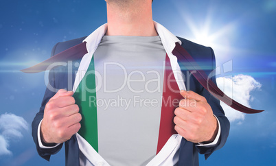 Businessman opening shirt to reveal italy flag