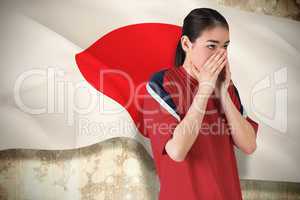 Nervous football fan looking ahead