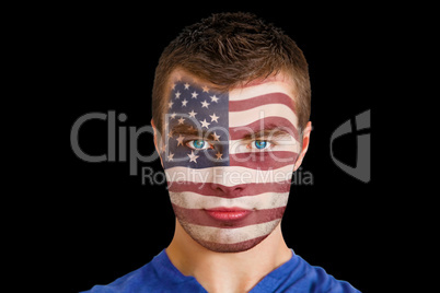 Serious young usa fan with facepaint