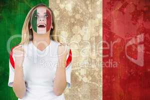 Excited italy fan in face paint cheering