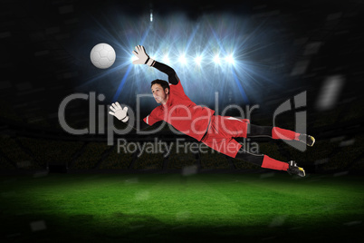 Fit goal keeper jumping up