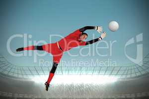 Fit goal keeper jumping up