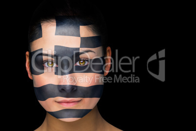 Greek football fan in face paint