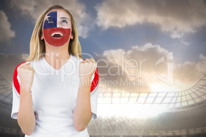 Excited chile fan in face paint cheering