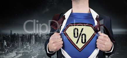 Composite image of businessman opening shirt in superhero style