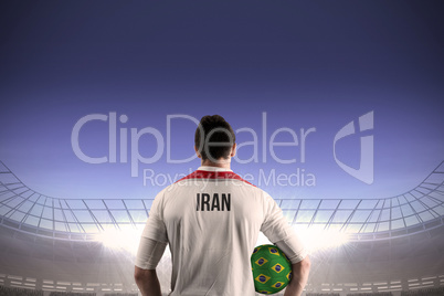 Iran football player holding ball