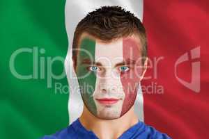 Serious young italy fan with facepaint