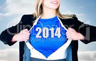 Composite image of businesswoman opening her shirt superhero sty