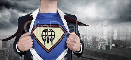 Composite image of businessman opening shirt in superhero style