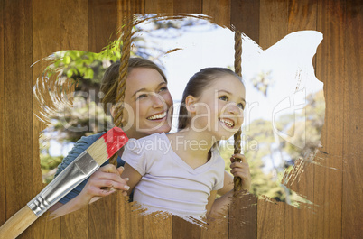 Composite image of mother and daughter in the park