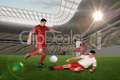 Football player in red kicking