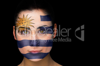 Uruguay football fan in face paint