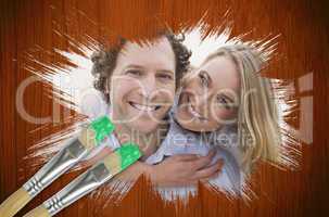 Composite image of couple smiling at camera